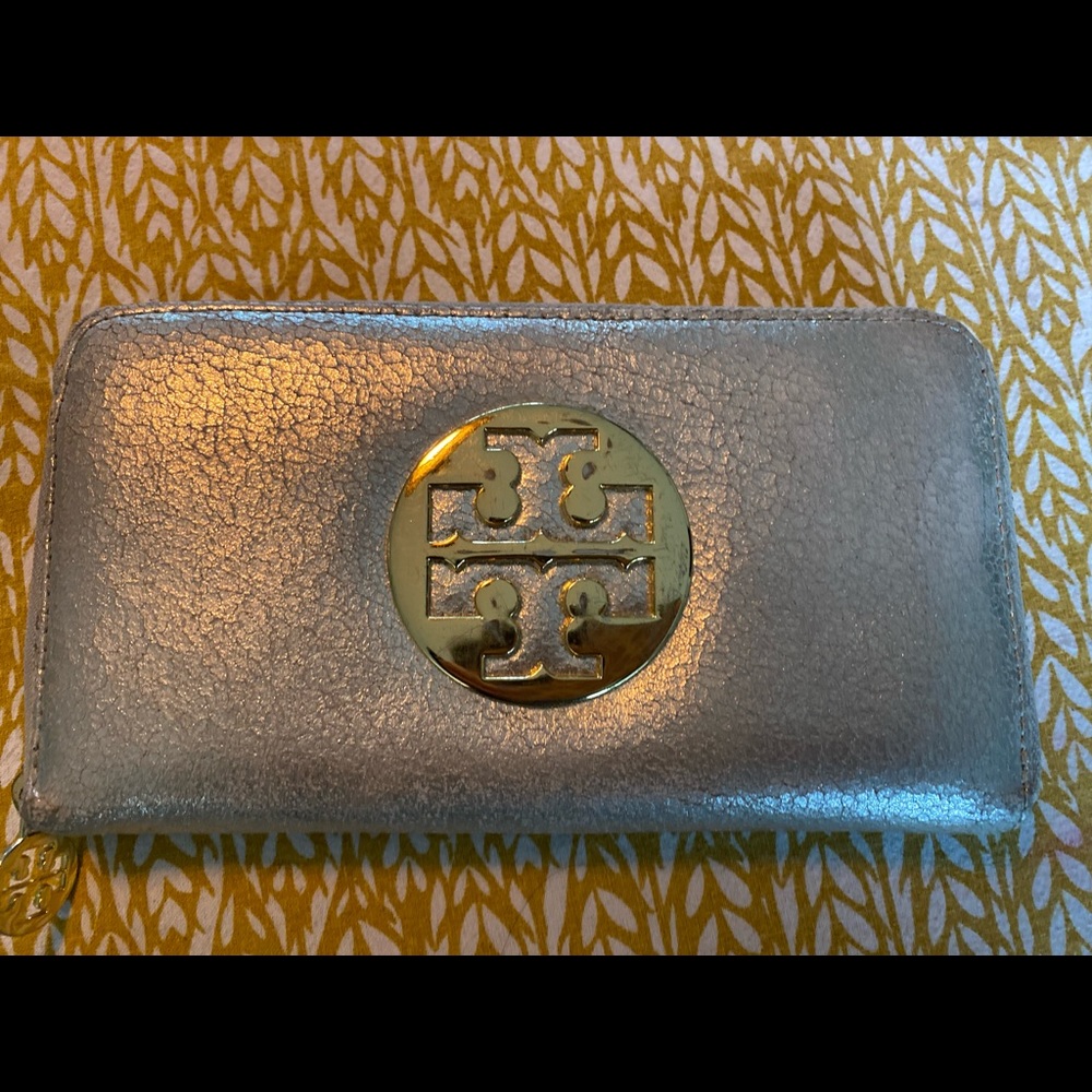 Metallic Tory Burch wallet.